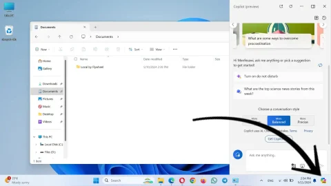 Windows 11 screenshot with arrow pointing to copilot AI